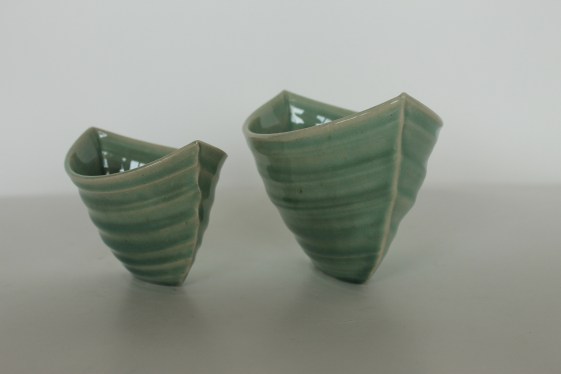 Green glossy pair boats